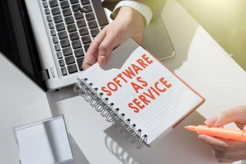 Text showing inspiration Software As Service. Business approach On Demand Stock Photos