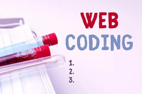 Text showing inspiration Web Coding. Concept meaning a system of symbols and Stock Photos