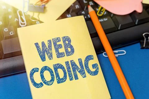 Text showing inspiration Web Coding. Business concept work involved in Stock Photos