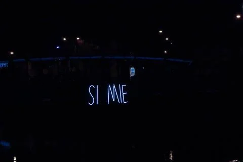 The text si mie on night time Stock Photos