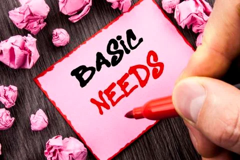 Text sign  Basic Needs. Business concept for Health In Developing Countries E Stock Illustration