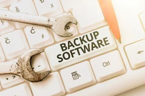 Text sign showing Backup Software. Conceptual photo create extra exact copies of Foto stock
