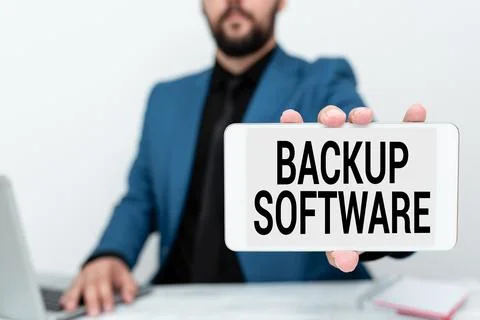 Text sign showing Backup Software. Word Written on create extra exact copies of Foto stock