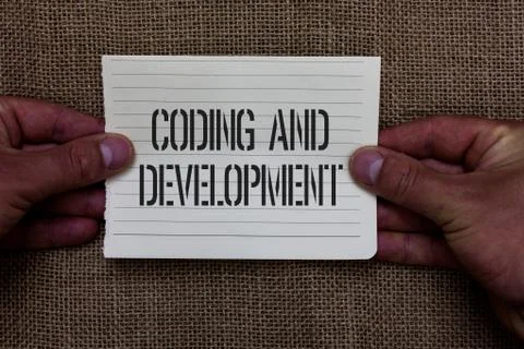Text sign showing Coding And Development. Conceptual photo Programming Building Stock Photos