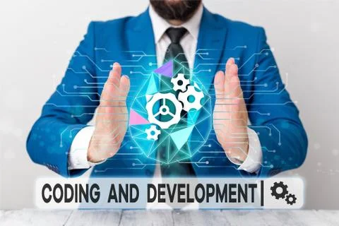 Text sign showing Coding And Development. Conceptual photo Programming Building Stock Photos