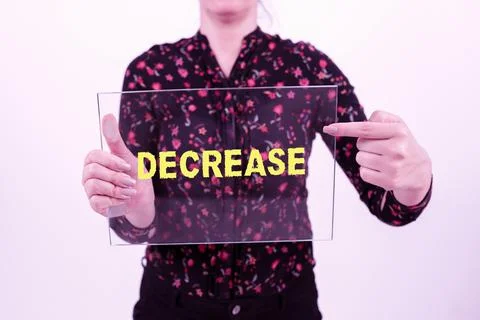 Text sign showing Decrease. Business approach make or become smaller or fewer in Stock Photos