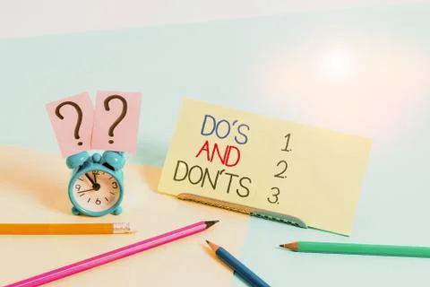Text sign showing Do S And Don Ts. Conceptual photo Technologically complication Stock Photos