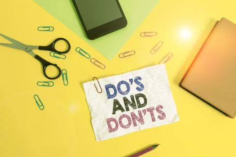 Text sign showing Do S And Don Ts. Conceptual photo Technologically complication Stock Photos