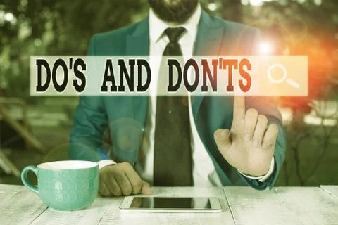 Text sign showing Do S And Don Ts. Conceptual photo Technologically complication Stock Photos