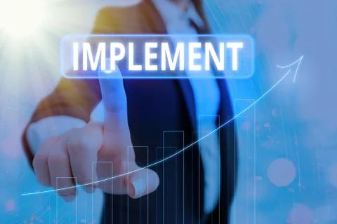 Text sign showing Implement. Conceptual photo to provide instruments or means of Stock Photos