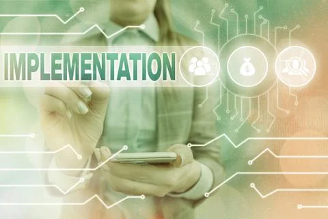 Text sign showing Implementation. Conceptual photo application of making 스톡 사진