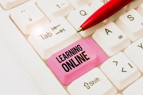 Text sign showing Learning OnlineLearn something new with the help of internet Fotos de archivo