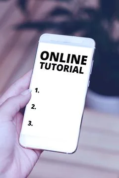 Text sign showing Online Tutorial. Business approach process of tutoring in an 库存照片