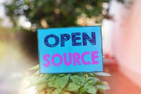 Text sign showing Open Source. Conceptual photo contains the source code that 库存照片