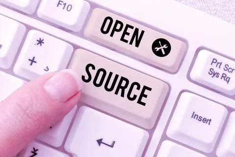 Text sign showing Open Source. Word Written on contains the source code that can Stock Photos