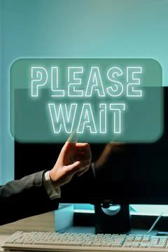 Text sign showing Please Wait. Word for to pause any implemented action Stock Photos