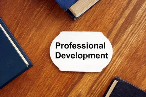Text sign showing Professional Development. The text is written on a small wo Stock Illustration