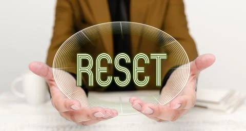 Text sign showing Reset. Concept meaning cause device return to its factory mode Stock Photos