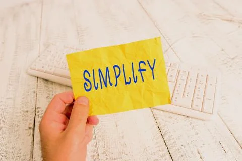 Text sign showing Simplify. Conceptual photo make something simpler or easier to Stock Photos