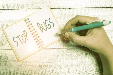 Text sign showing Stop Bugs. Business concept Get rid an insect or similar small Stock Photos