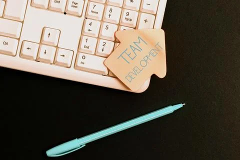 Text sign showing Team Development. Word for learn why and how small groups Stock Photos