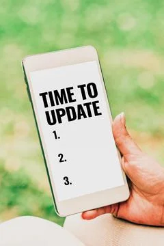 Text sign showing Time To Update. Word Written on American brand United States 스톡 사진