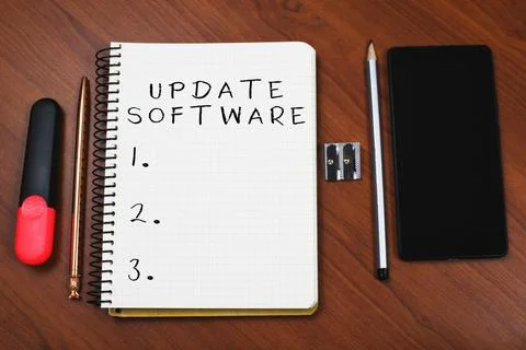 Text sign showing Update Softwarereplacing program with a newer version of same Stock Photos