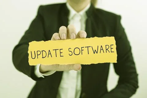 Text sign showing Update Softwarereplacing program with a newer version of same Stock Photos