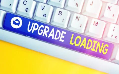 Text sign showing Upgrade Loading. Conceptual photo advancement of applications 库存照片