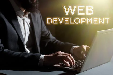 Text sign showing Web Development. Word for work involved in developing a Stock Photos