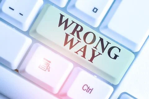 Text sign showing Wrong Way. Conceptual photo taking an unsuitable or Foto stock