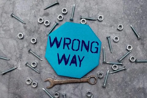 Text sign showing Wrong Way. Business approach taking an unsuitable or Foto stock