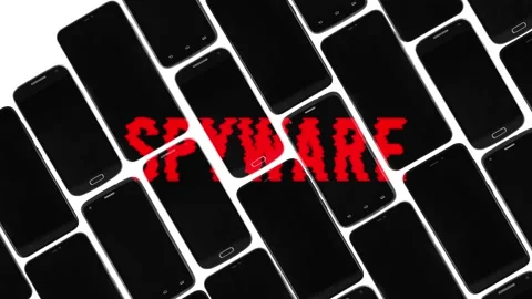 Text spyware on black smartphones, looping animation, title for intro video Видео 130493968