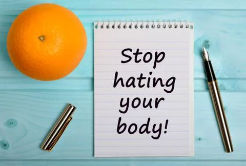 Text Stop hating your body Stock Photos
