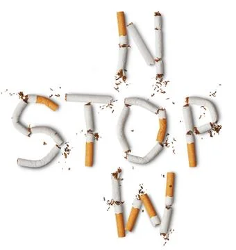Text stop now made from broken cigarettes Stock Photos
