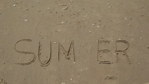 Text Summer Written on the Sand of a Beach. The Sea on a Background of Letters Stock Footage 166697340