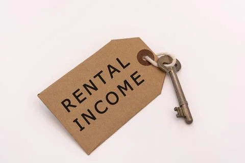 Text on a tag with key on white background - Real estate negotiator Stock Photos