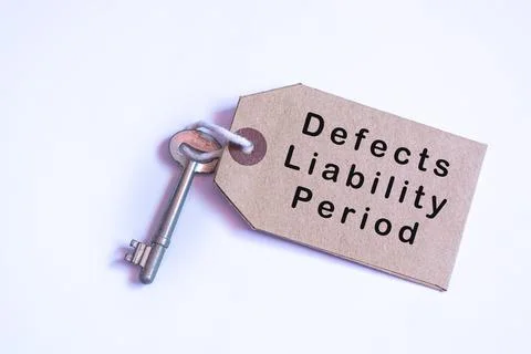 Text on a tag with key on white background. Property concept Foto stock