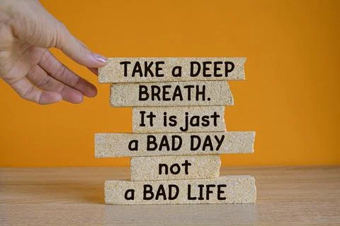 Text Take a deep breath. It is just a bad day, not a bad life on brick blocks Stock Photos