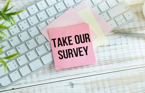 Text Take Our Survey on the envelope on the keyboard Stock-Fotos