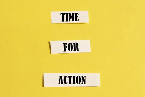 The text time for actions on a yellow background. Business concept Stock Photos