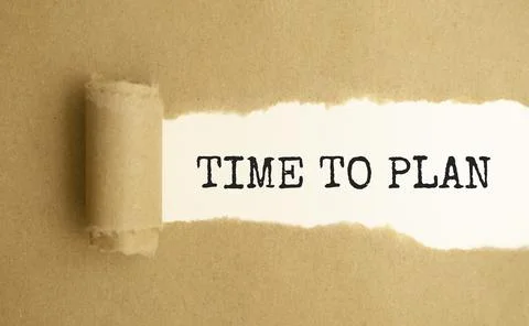 The text time to invent appearing behind torn paper. Stock-Fotos