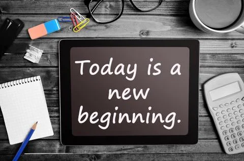 Text Today is a new beginning on tablet Stock Photos