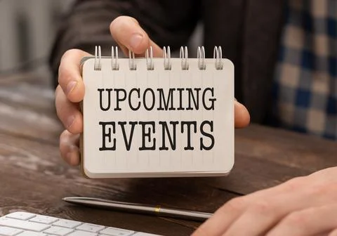 Text Upcoming Events written in notepad, Office desk with electronic device.. Foto stock