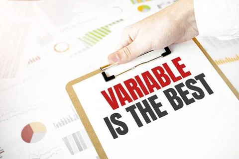 Text variable is the best on white paper plate in businessman hands with fina Fotos de archivo