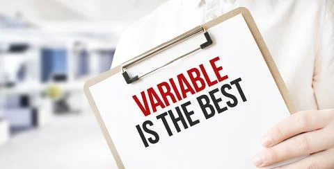 Text variable is the best on white paper plate in businessman hands in office Fotos de archivo