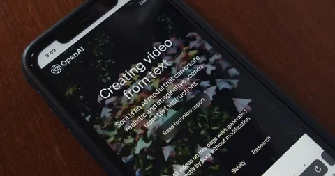 Text-to-video AI model Sora (OpenAI) website seen in iPhone Stock Footage 264933632