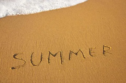 Text on wet sand Stock Photos