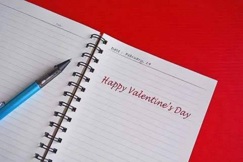 Text on white notepad with red background. Valentine's day concept Stock Photos