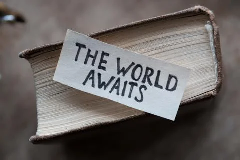 Text The World Awaits Stock Photos